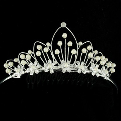 Inside sources report John has his eye on this very attractive pearl tiara