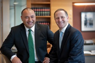 MP for SERCO, Sam Lotu-Iiga, chats with John Key after graduating from the Simon Lusk School of Politics.